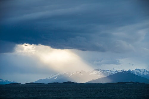 Argentina Travel Landscape Photography Andes Mountain range seen form the Beagle Channel in Ushuaia Tierra Del Fuego Patagonia Argentina South America