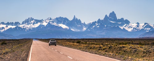 Argentina Travel Landscape Photography Long straight road to El Chalten with Mount Fitz Roy aka Cerro Chalten behind El Chalten Patagonia Argentina South America