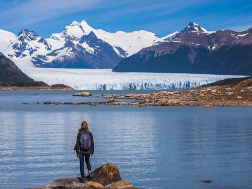 Argentina Travel Landscape Photography Woman on holiday in Argentina sightseeing while visiting Perito Moreno Glacier Los Glaciares National Park near El Calafate Patagonia Argentina South America