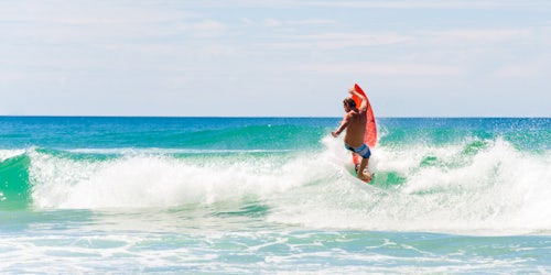 Australia Travel Photography Panoramic Photo of a Guy Surfing at Surfers Paradise Beach Gold Coast of Australia
