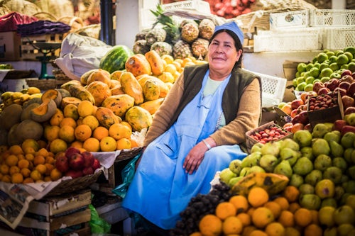 Bolivia Travel Landscape Photography Portrait of a fruit and vegetable vendor Campesino Market Mercado Campesino Sucre Bolivia South America