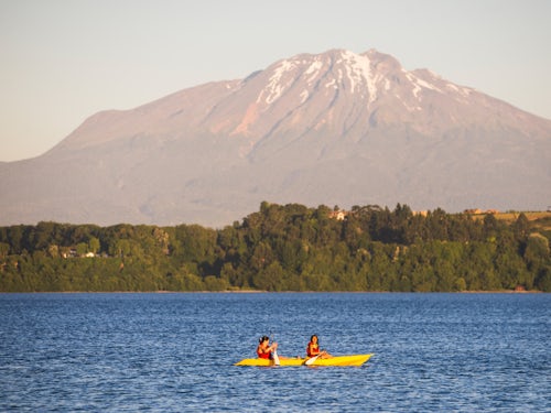 Chile Travel Landscape Photography Kayaking on Llanquihue Lake with Calbuco Volcano behind Puerto Varas Chile Lake District South America
