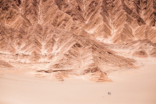 Chile Travel Landscape Photography Tourists in sand dunes at Death Valley Valle de la Muerte San Pedro de Atacama Atacama Desert North Chile South America 3
