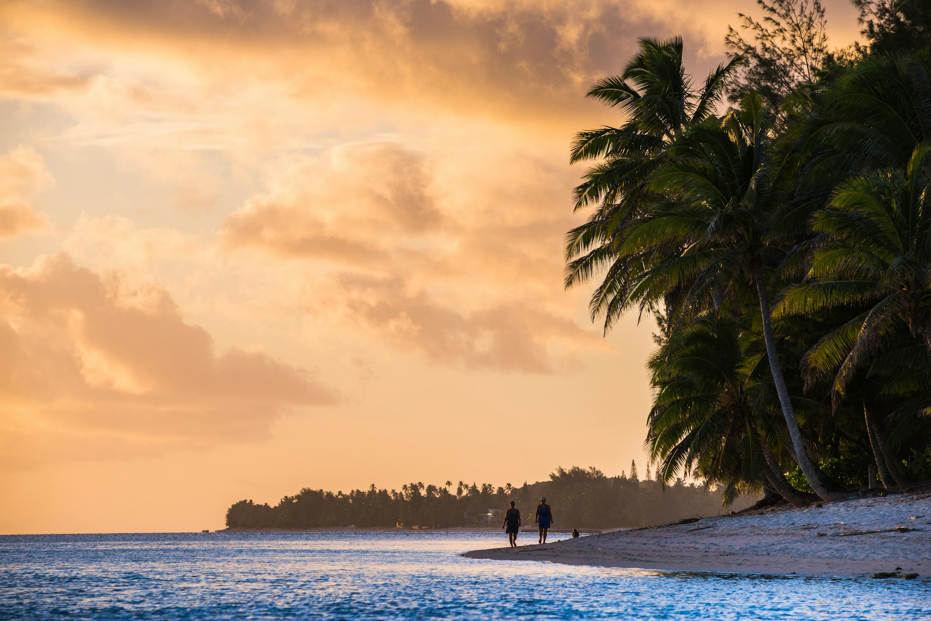 Cook Islands Landscape Travel Photography Walking along a tropical beach at sunset Rarotonga Cook Islands