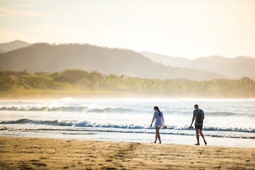 Costa Rica Travel Landscape Photography Couple on Playa Buena Vista Beach at sunrise Guanacaste Province Costa Rica