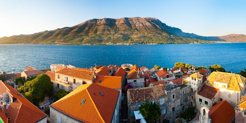 Croatia Travel Photography Panoramic photo of Korcula Town at sunset elevated view from St Marks Cathedral bell tower Korcula Island Croatia