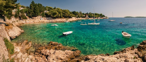 Croatia Travel Photography Panoramic photo of boats on the crystal clear Adriatic Sea Hvar Island Adriatic Coast Dalmatia Dalmacija Croatia