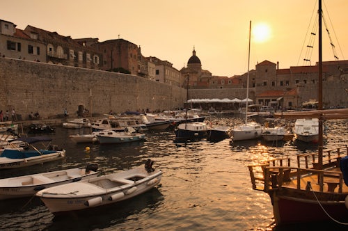Croatia Travel Photography Photo of Dubrovnik City Walls at sunset and Dubrovnik Old Town Harbor Croatia