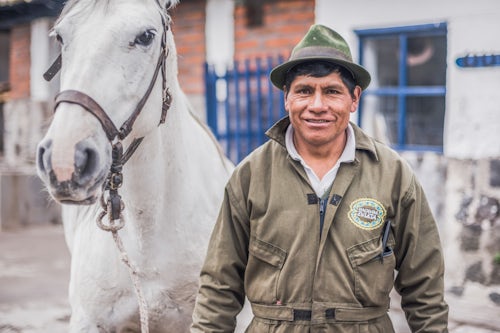 Ecuador Travel Photography Portrait of the stable man at the horse stables at Hacienda Zuleta Imbabura Ecuador South America