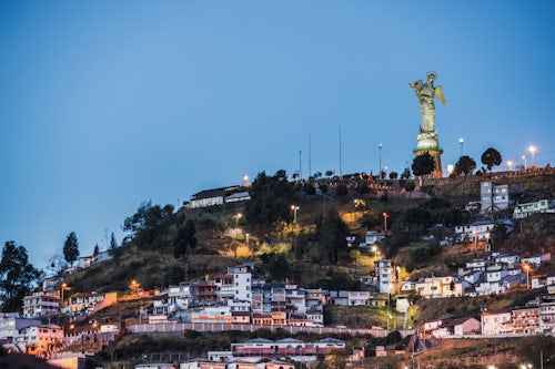 Ecuador Travel Photography Statue of the Virgin of Quito at night El Panecillo Hill Statue City of Quito Ecuador South America