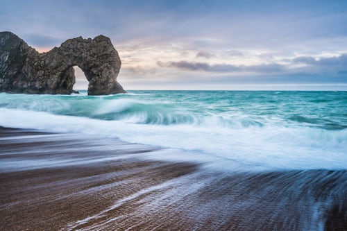 England Landscape Photography Photographer Durdle Door at sunrise Lulworth Cove Jurassic Coast Dorset England 2