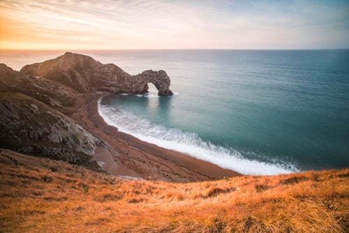 England Landscape Photography Photographer Durdle Door at sunrise Lulworth Cove Jurassic Coast Dorset England