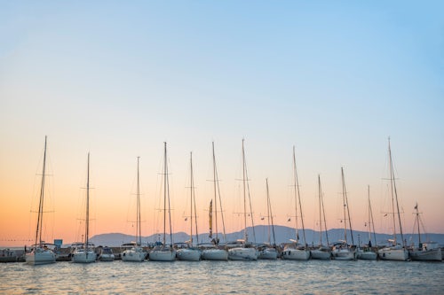 Greece Travel Photography Sailing boats at sunset on Agistri Island Saronic Islands Greece