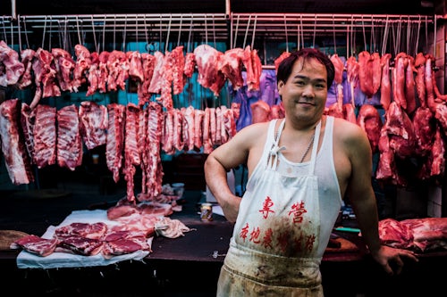 Hong Kong Street Photography Meat vendor Wet Market in Chun Yeung Street Hong Kong Island Hong Kong China