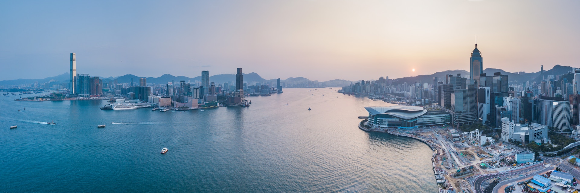 Hong Kong Travel Photography View over Victoria Harbour and Hong Kong at sunset China Drone