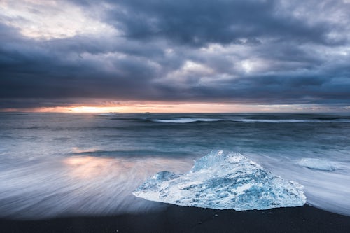 Iceland Landscape Photography Iceberg at sunrise on Jokulsarlon Beach a black volcanic sand beach in South East Iceland 2
