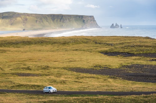 Iceland Travel Photography Driving on Dyrholaey Peninsula with Reynisdrangar Sea Stacks behind near Vik South Iceland Sudurland