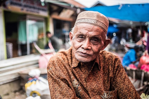 Indonesia Travel Portrait Photography Portrait of a vendor in Bukittinggi Market West Sumatra Indonesia Asia