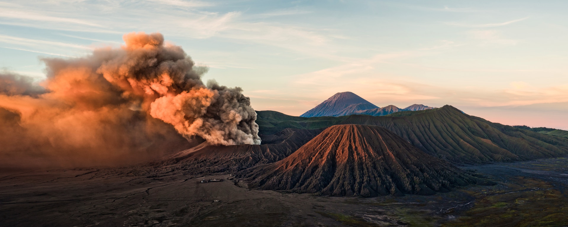 Indonesia Landscape Travel Photography April 10th Extremely Active Mount Bromo Throwing up Ash Clouds at sunrise in May 2011 with Mount Sumeru in the Background Gunug Bromo East Java Indonesia Asia