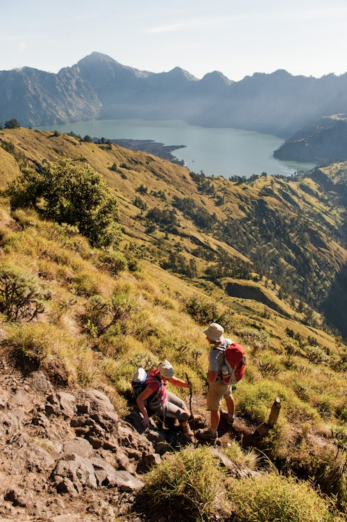 Indonesia Travel Photography Tourists Take a Break on the Challenging Three Day Mount Rinjani Trek to the 3726m Summit Lombok Indonesia Asia