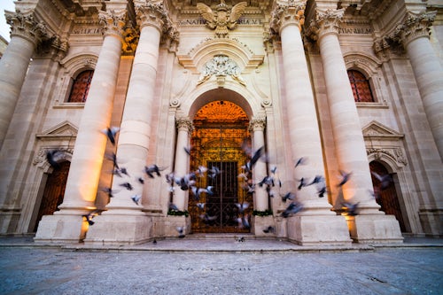 Italy Sicily Travel Photography Pigeons at The Temple of Athena aka Syracuse Cathedral or Duomo di Siracusa Ortigia Ortygia Syracuse Siracusa UNESCO World Heritage Site Sicily Italy Europe