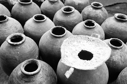 Laos Travel Photography Black and White Photo of Distilling Homemade Whisky Rice Wine Luang Prabang Laos Southeast Asia