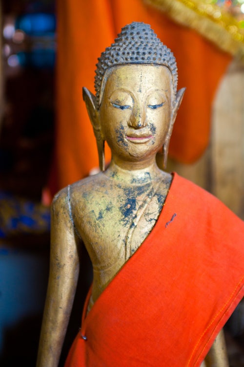 Laos Travel Photography Wooden Buddha in Luang Prabang Laos Southeast Asia