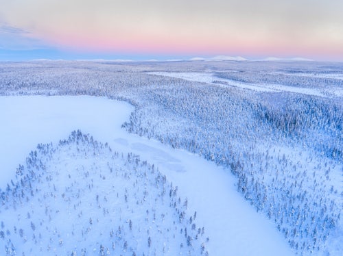 Lapland Finland Drone Landscape Photography Snow covered lake and forest winter landscape showing amazing Lapland scenery in Scandinavia in Finland drone 2