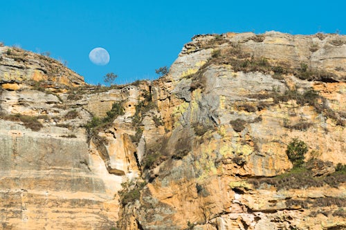 Madagascar Landscape Photography Moon over mountains of Isalo National Park Ihorombe Region Southwest Madagascar