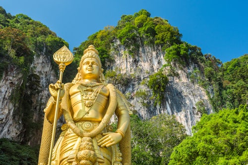 Malaysia Kuala Lumpur Travel Photography Lord Murugan Statue the largest statue of a Hindu Deity in Malaysia at the entrance to Batu Caves Kuala Lumpur Malaysia Southeast Asia