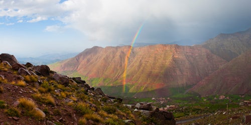 Morocco Travel Landscape Photography Moroccan High Atlas landscape showing a rainbow in the mountains just outside Oukaimeden Ski Resort Morocco North Africa