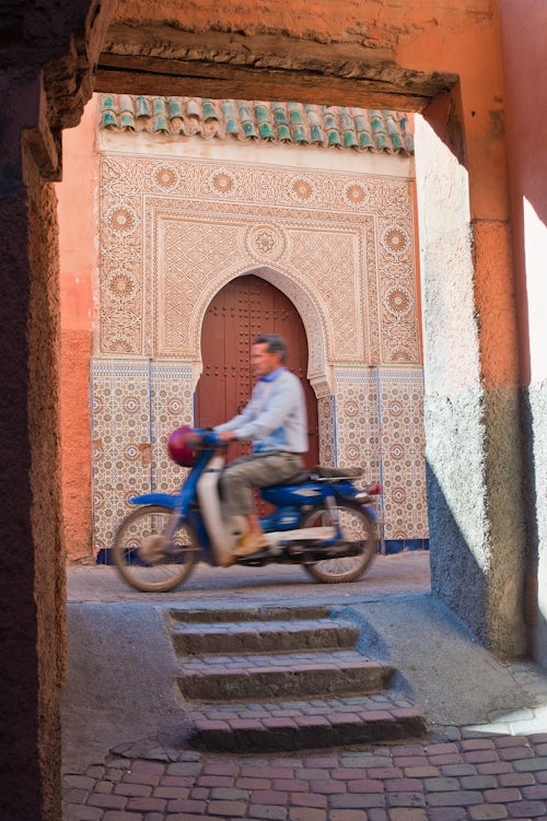 Morocco Travel Photography Moped speeding through the old Medina Marrakech Marrakesh Morocco North Africa Africa