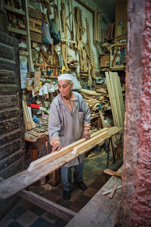 Morocco Travel Portrait Photography Portrait photo of a carpenter working in his workshop Marrakech Marrakesh Morocco North Africa Africa