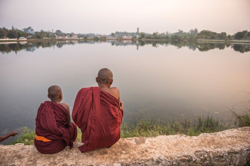 Myanmar Burma Travel Photography Buddhist Monks at Kandawgyi Lake at sunset Pyin Oo Lwin aka Pyin U Lwin Mandalay Region Myanmar Burma