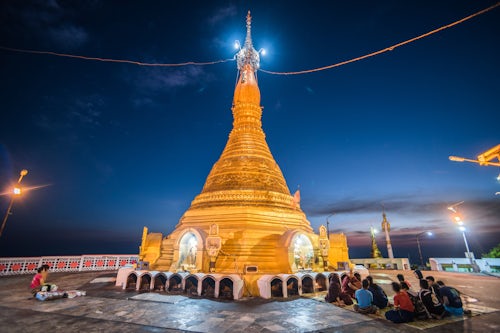 Myanmar Burma Travel Photography Gold Stupa at Mount Zwegabin Monastery at night Hpa An Kayin State Karen State Myanmar Burma