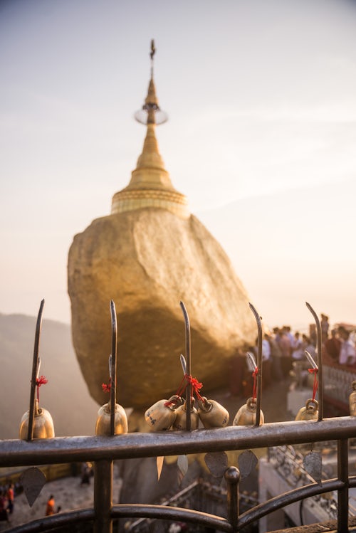 Myanmar Burma Travel Photography Prayer bells at sunset at Golden Rock Stupa Kyaiktiyo Pagoda Mon State Myanmar Burma