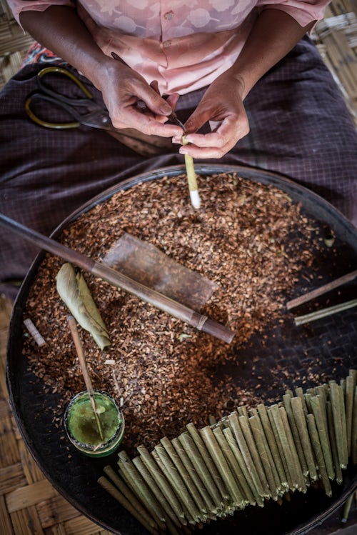 Myanmar Burma Travel Photography Rolling hand made cheroot cigars a traditional Burmese cigar Inle Lake Shan State Myanmar Burma
