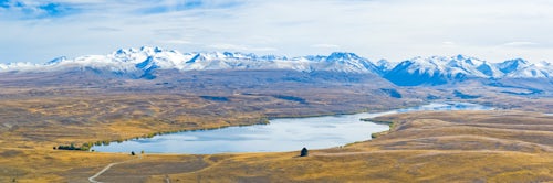 New Zealand Landscape Photography Panoramic Photo of Lake Alexandrina and Snow Capped Mountains in South Island New Zealand