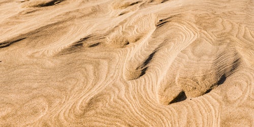 New Zealand Nature Photography Close Up Panoramic Photo of Sand Patterns at Wharariki Beach Golden Bay South Island New Zealand