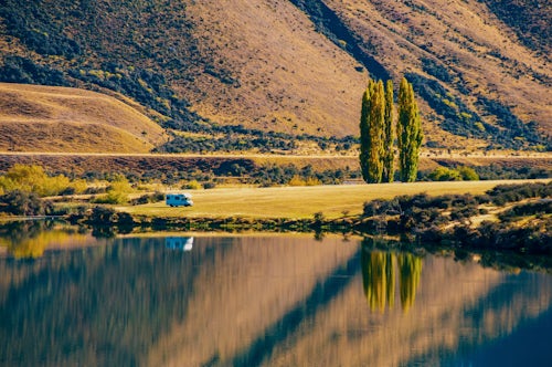 New Zealand Travel Photography Lake Moke campsite caravan reflections at dawn Queenstown South Island New Zealand