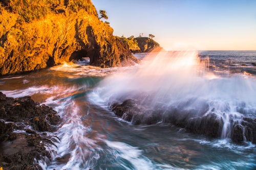 New Zealand Landscape Photography Waves at sunrise Rocky Bay at Tapeka Point Russell Bay of Islands Northland Region North Island New Zealand