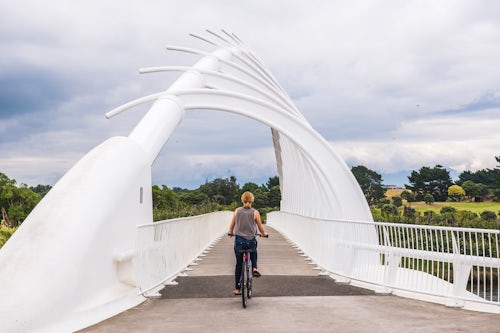 New Zealand Travel Photography Cycling on Te Rewa Rewa Bridge part of New Plymouth 12 7km award winning Coastal Walkway Taranaki Region North Island New Zealand