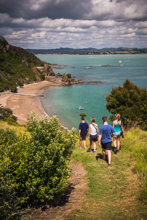 New Zealand Travel Photography Family walking on Tapeka Point Russell Northland Region North Island New Zealand