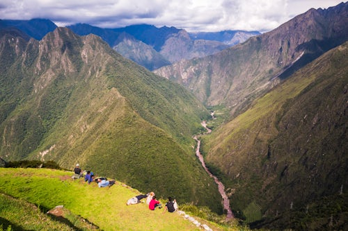 Peru Travel Photography Tourists at Winaywayna Inca Ruins on Inca Trail Trek day 3 Cusco Region Peru South America