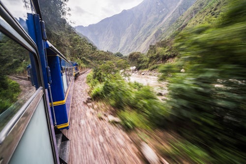 Peru Travel Photography Train between Aguas Calientes Machu Picchu stop and Ollantaytambo Cusco Region Peru South America