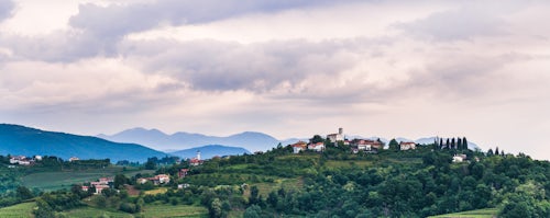 Slovenia Landscape Photography Vineyards in Goriska Brda showing Chiesa di San Floriano del Collio and the hill top town of Gornje Cerovo Goriska Brda Slovenia Europe