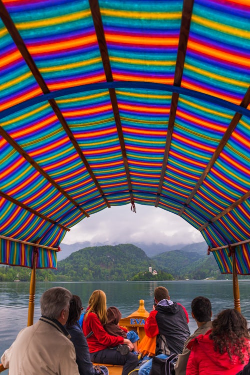 Slovenia Travel Photography Traditional Pletna rowing boat ride to Lake Bled Island and the Church of Assumption Bled Gorenjska Slovenia Europe