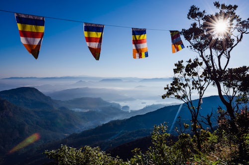 Sri Lanka Travel Photography Adams Peak Sri Pada misty mountain view with Buddhist flags Central Highlands of Sri Lanka Asia