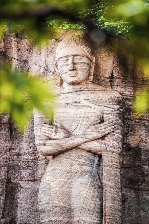 Sri Lanka Travel Photography Ancient City of Polonnaruwa Buddha standing on lotus plinth at Gal Vihara Rock Temple Gal Viharaya UNESCO World Heritage Site Sri Lanka Asia