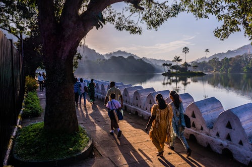 Sri Lanka Travel Photography Sri Lankan people walking at Kandy Lake at sunrise Kandy Central Province Sri Lanka Asia